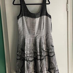 Knee length, light weight “fit and flare” black and white dress